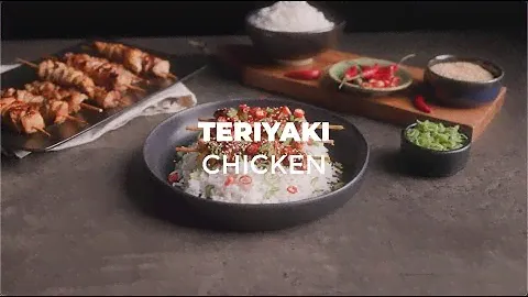 Teriyaki chicken skewer on the teppanyaki